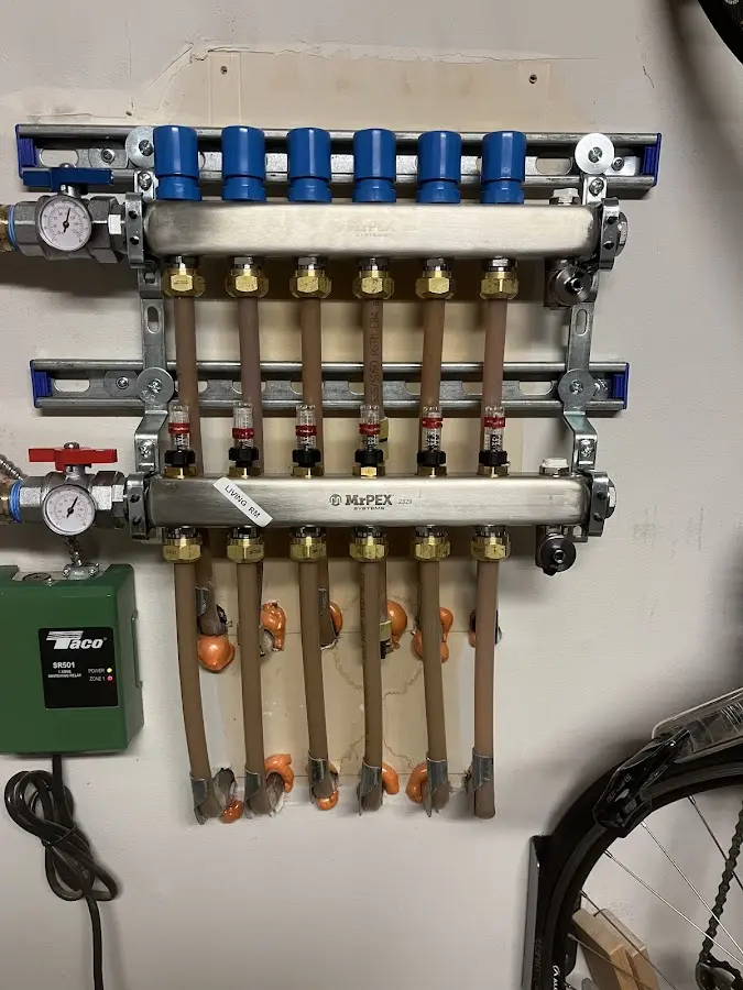 Plumber performing Gas Line Installation at a residential property in Bowdoinham